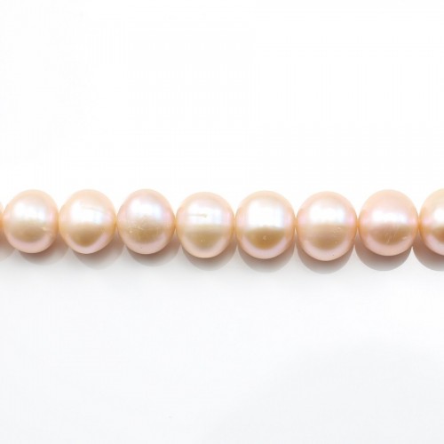 Salmon color oval freshwater cultured pearls on thread 9x10mm x 40cm