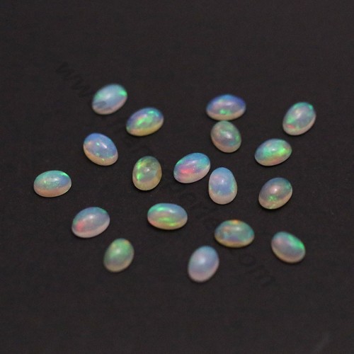 Cabochon ovale di opale etiope 5x7 mm x 1 pz