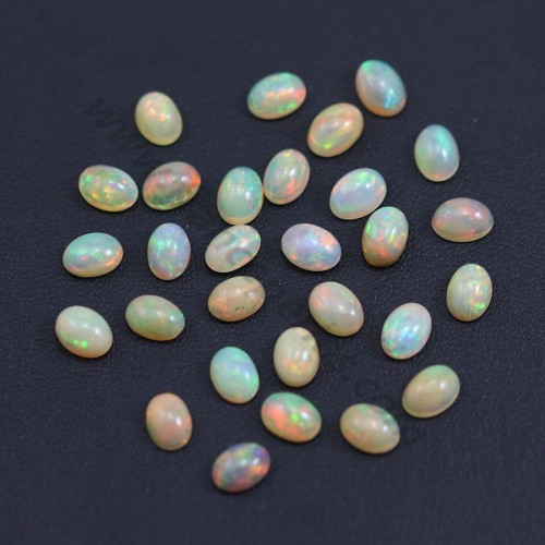 Äthiopischer Opal-Cabochon, mehrfarbig, oval, 5x7mm x 1Stk