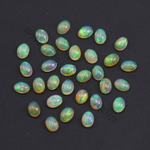 Äthiopischer Opal-Cabochon, mehrfarbig, oval, 5x7mm x 1Stk