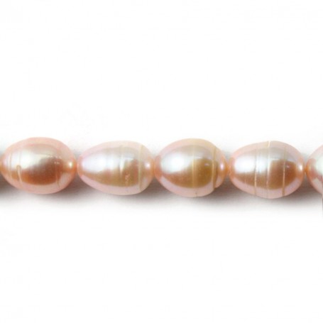 Salmon color oval freshwater pearls on thread 8x10mm x 40cm