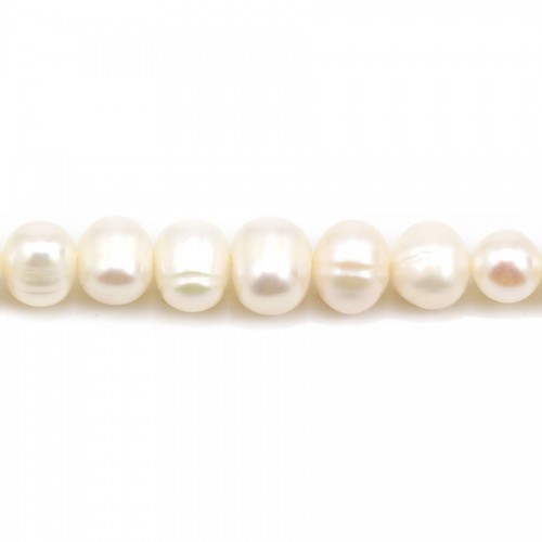 White freshwater cultured pearls on thread 6-7mm x 36cm