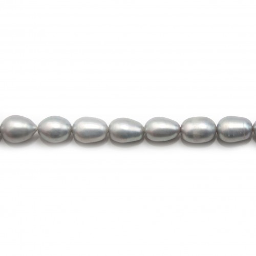 Perles d'eau douce ovales gris clair argenté sur fil 7-8mm x 40cm