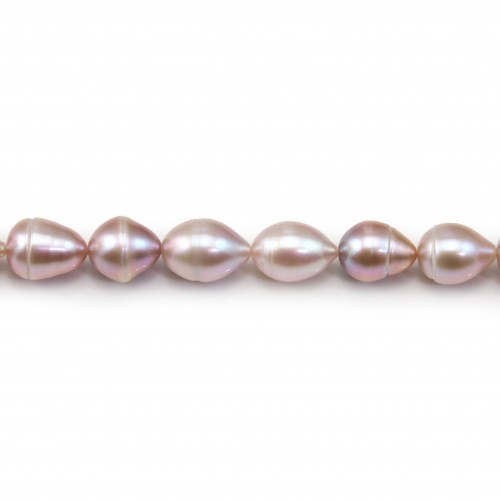 Salmon color oval freshwater pearls on thread 9-10mm x 40cm