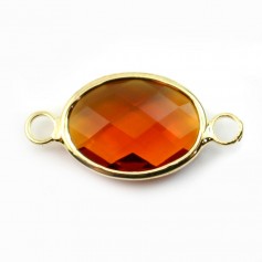 Oval faceted glass set in golden metal 11x14mm x 1pc