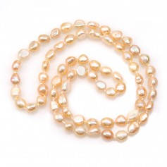 Long necklace in oval salmon fresh water cultured pearl, 8 * 10mm x 1pc