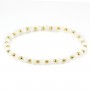 Armband aus weißem Perlmutt 4mm, mit goldenen Perlen - Gummiband x 1St