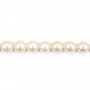 White oval freshwater pearls on thread 6-7mm x 40cm